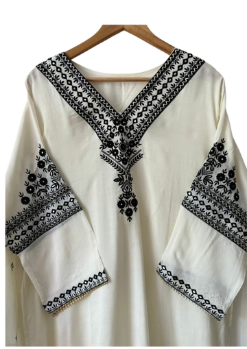 Handmade off-white tunic from Ashir Studio, featuring soft fabric and elegant design, perfect for casual or formal wear.