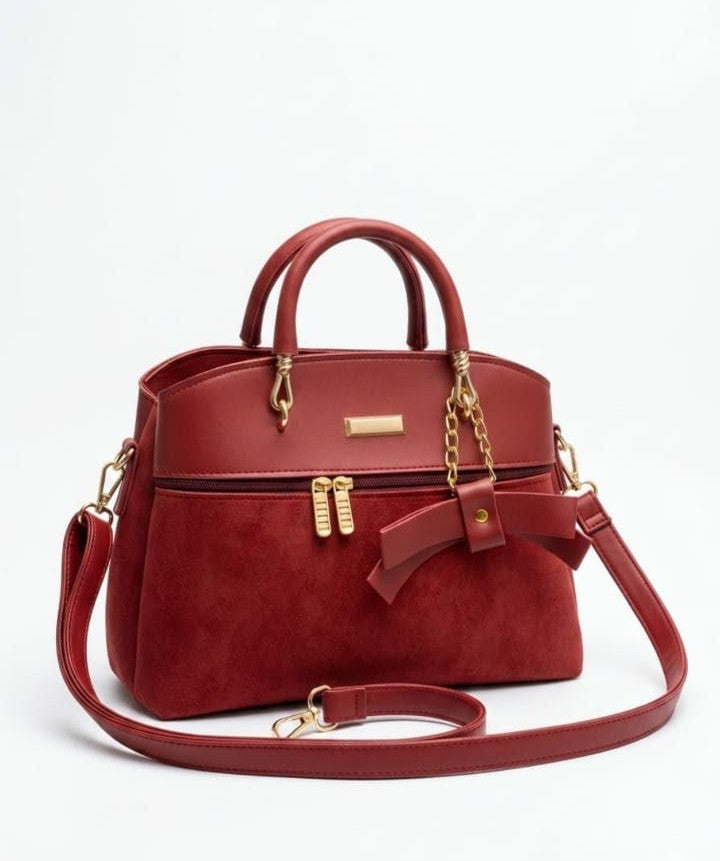 Mixed-media bow accent satchel jewelry by Ashir Studio featuring a stylish bow design and intricate mixed-media details.