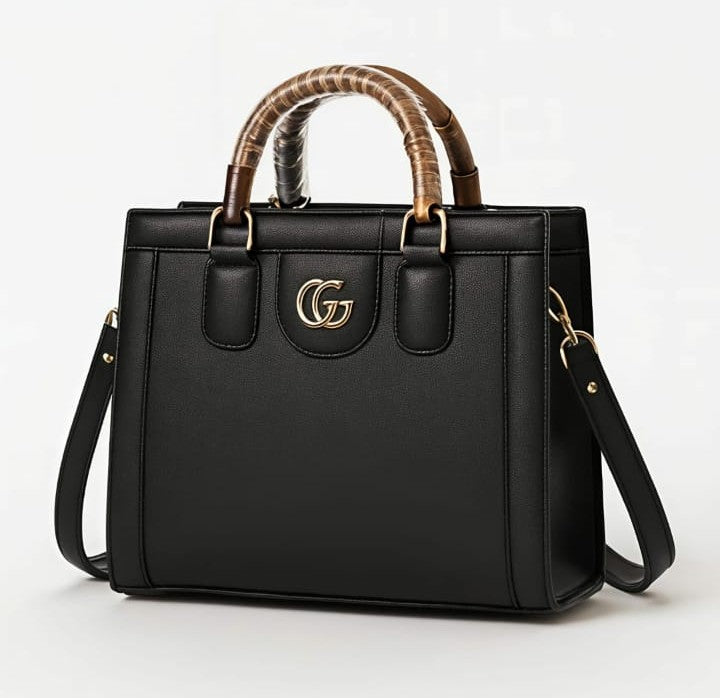 Ashir Studio The Executive Noir Statement Tote jewelry featuring sleek black design and elegant accents.