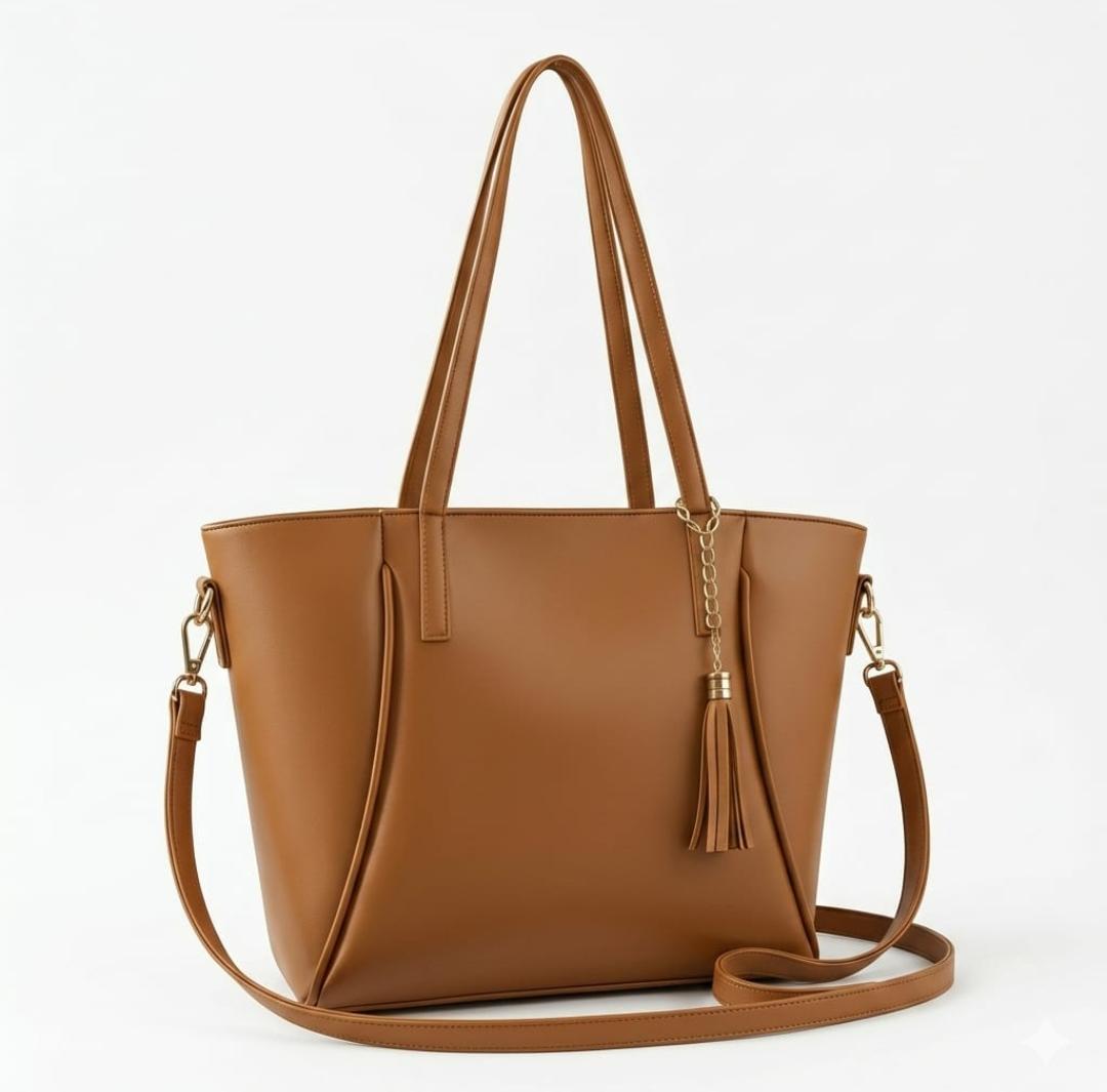 Ashir Studio tassel accent signature tote with intricate jewelry-inspired design and decorative tassels.