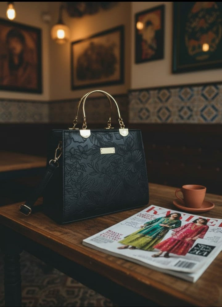 Ashir Studio floral embossed luxury tote collection showcasing intricate jewelry-inspired embossed patterns and elegant design.