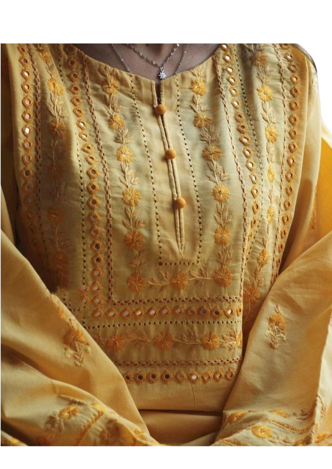 Mustard yellow kurta from Ashir Studio, showcasing traditional cloth with intricate embroidery and comfortable fit.