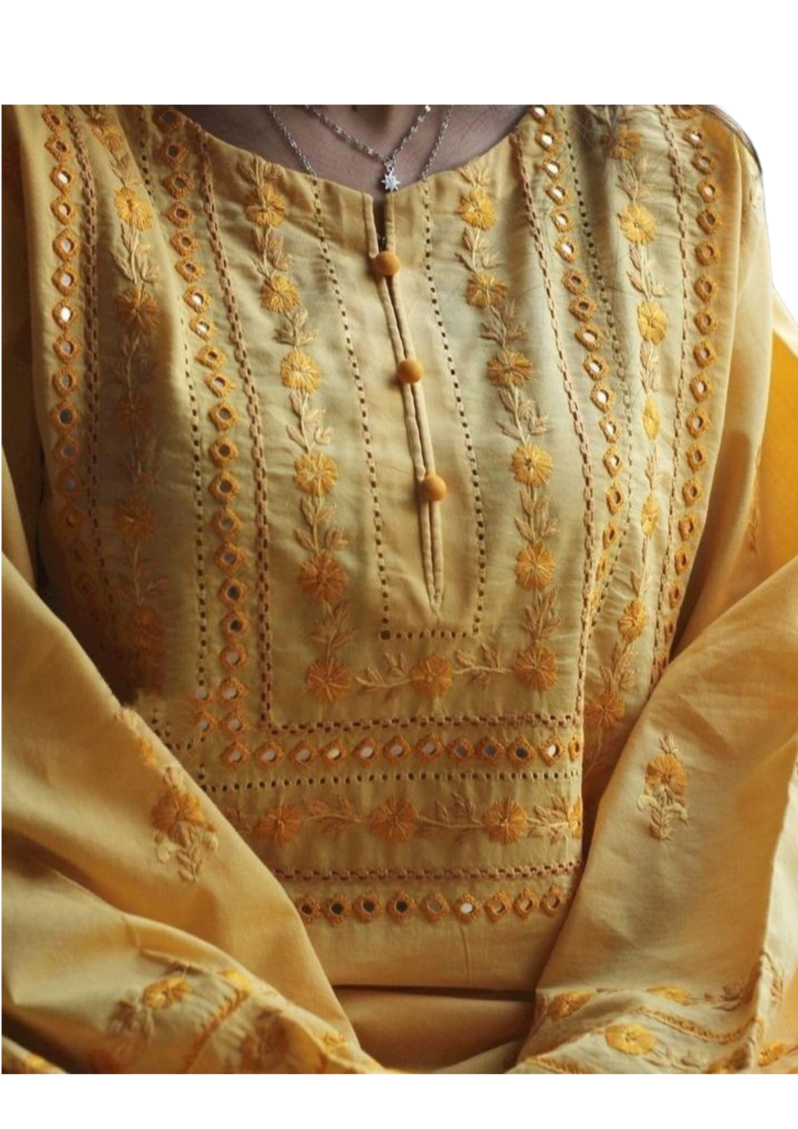 Mustard yellow kurta from Ashir Studio, showcasing traditional cloth with intricate embroidery and comfortable fit.