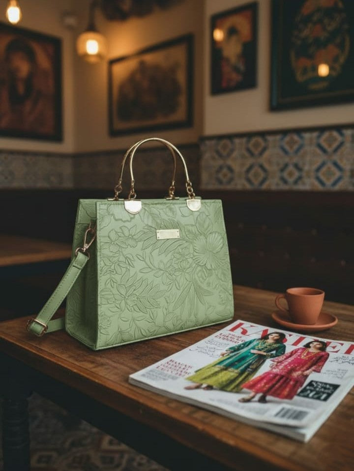 Ashir Studio floral embossed luxury tote collection jewelry, featuring intricate floral patterns and elegant design details