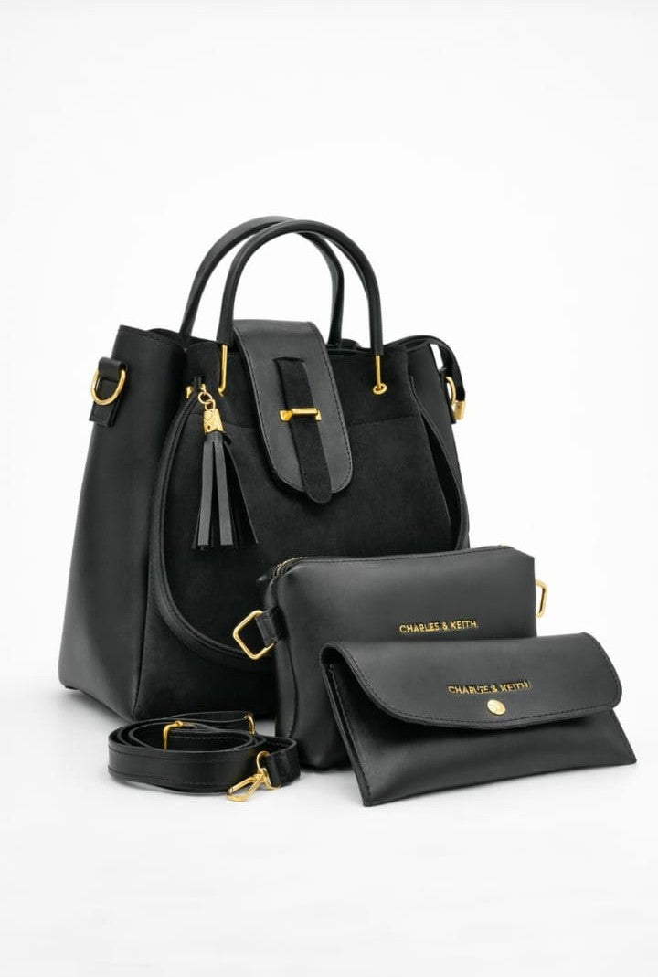 Ashir Studio Noir Luxe 3-piece suede and leather jewelry collection featuring elegant necklaces and accessories displayed on a neutral background.