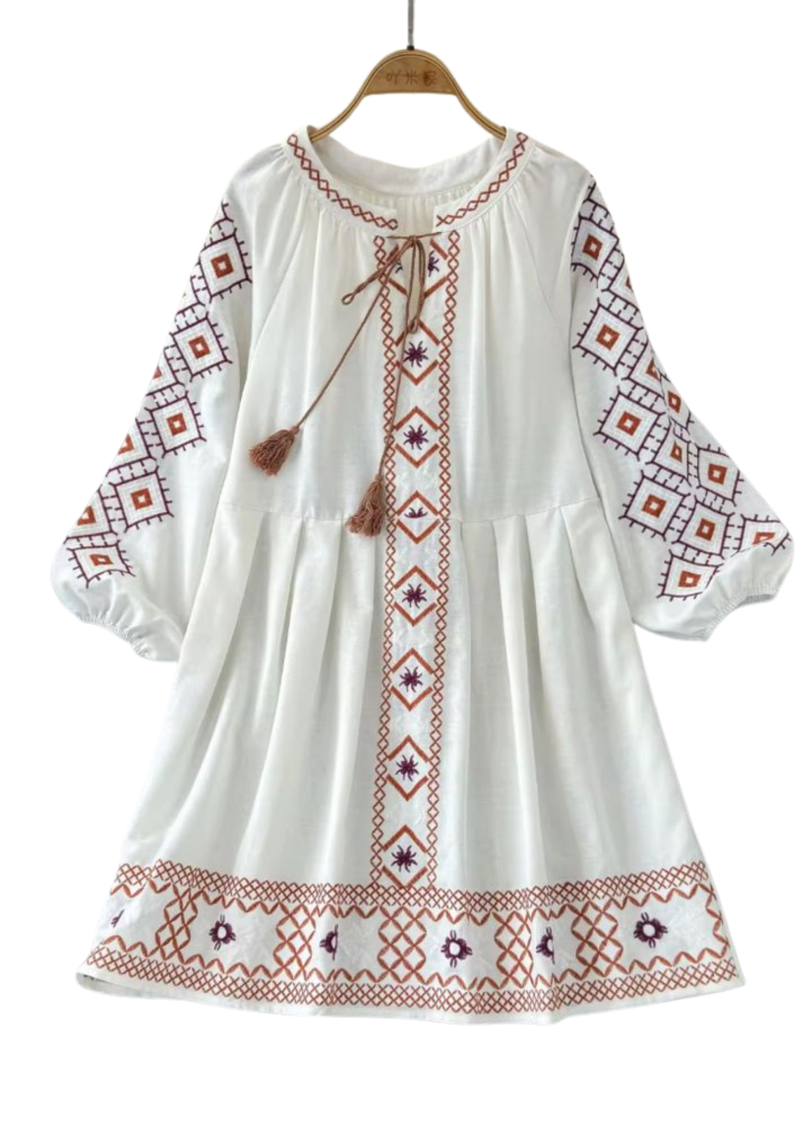 Handmade white boho tunic from Ashir Studio featuring flowy fabric and intricate embroidery, perfect for casual or bohemian style.