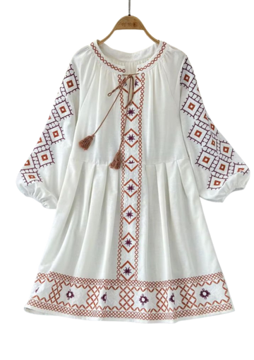 Handmade white boho tunic from Ashir Studio featuring flowy fabric and intricate embroidery, perfect for casual or bohemian style.
