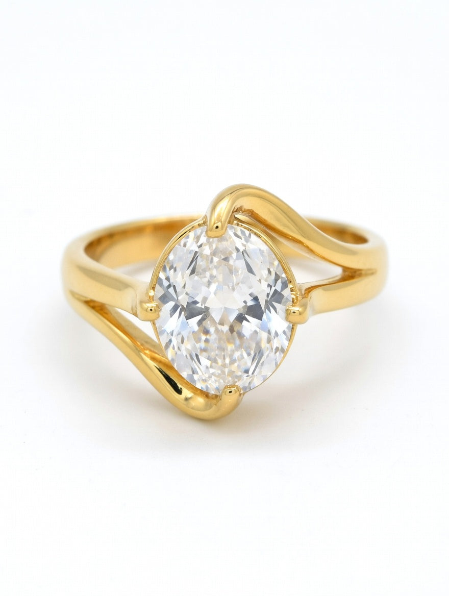 Gold-plated Radiant Oval Solitaire Bypass Ring by Ashir Studio with a sleek, tarnish-free design in jewelry style.