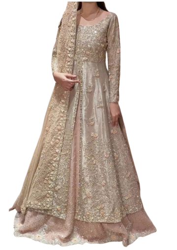 Champagne gold bridal gown from Ashir Studio featuring a front-open jacket and matching lehenga with intricate embroidery.