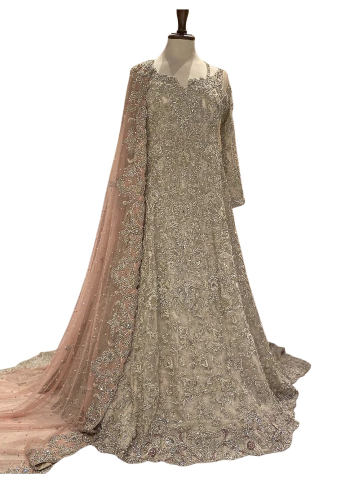 Silver embroidered bridal maxi gown with peach-toned dupatta by Ashir Studio, showcasing intricate embroidery and elegant fabric details.
