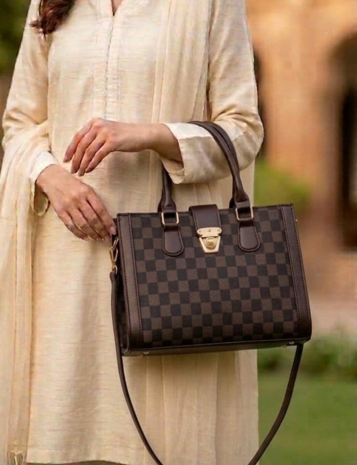 Heritage checkered satchel jewelry by Ashir Studio featuring a woven design and compact structure for stylish accessorizing.