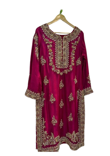 Handmade magenta silk kurta from Ashir Studio, featuring elegant fabric and traditional design, displayed flat on a white background.