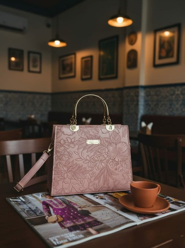 Ashir Studio floral embossed luxury tote collection jewelry display with intricate floral details and elegant design.