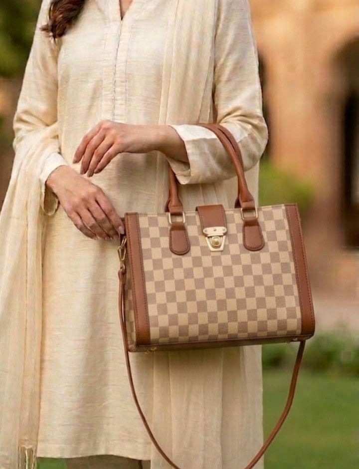 Heritage checkered satchel jewelry holder by Ashir Studio with a stylish checkered design and compact, functional shape.