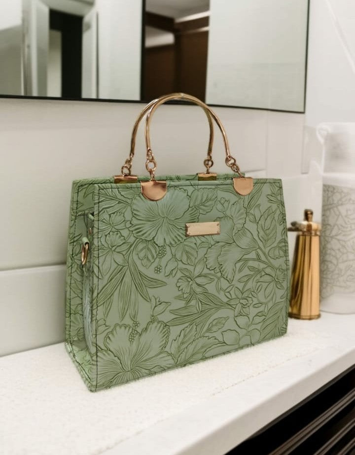 Floral embossed luxury tote jewelry collection by Ashir Studio featuring intricate floral designs and elegant craftsmanship.