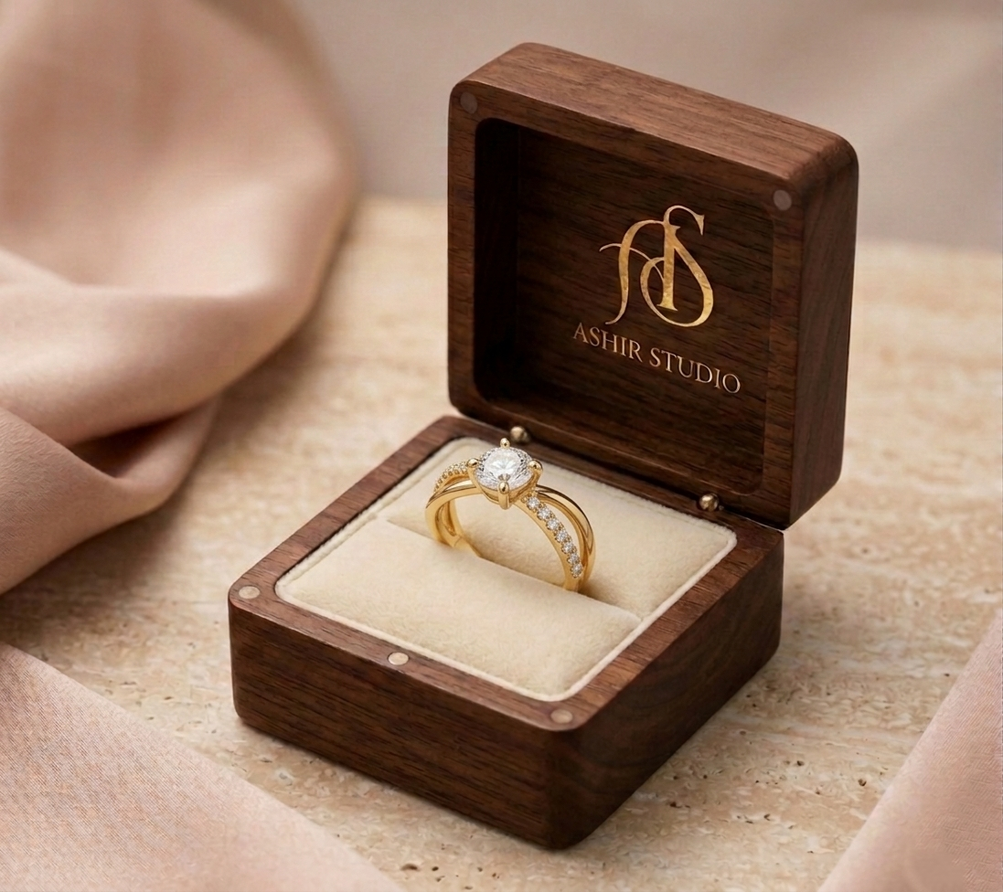 Round moissanite crossover ring in 18K yellow gold plating, elegant jewelry design with sparkling gemstones.