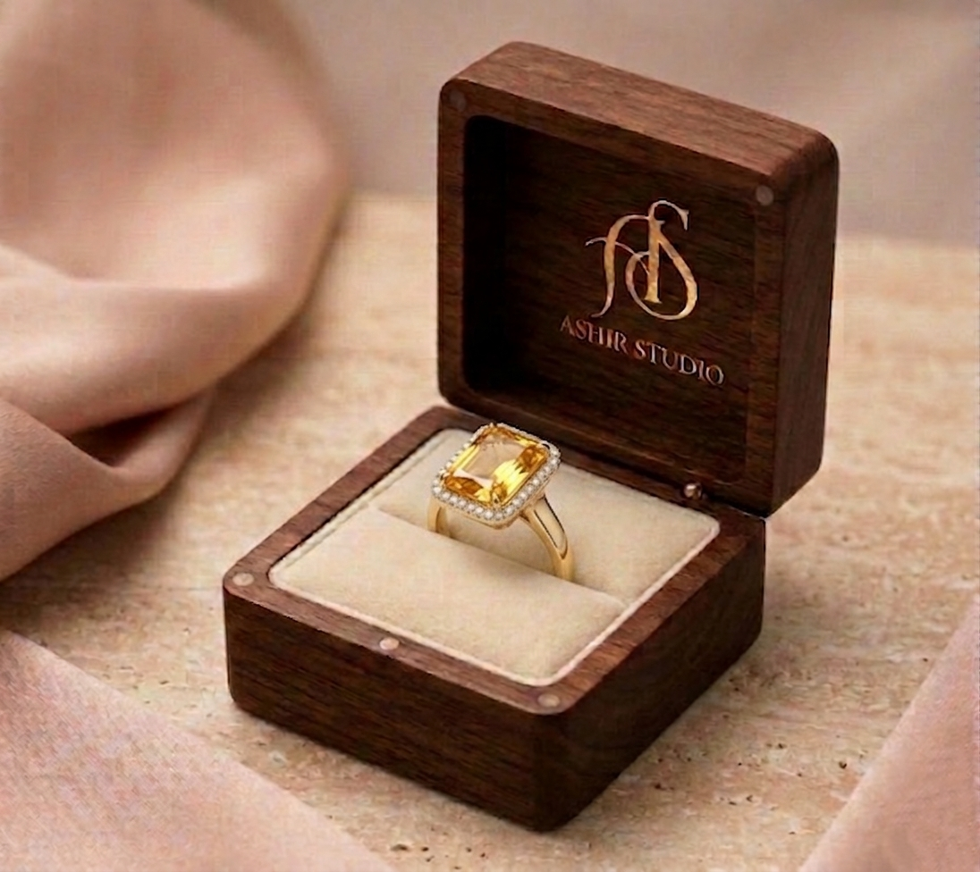 Ashir Studio radiant sunshine cushion-cut citrine halo statement ring featuring a large central citrine gemstone and intricate metalwork.