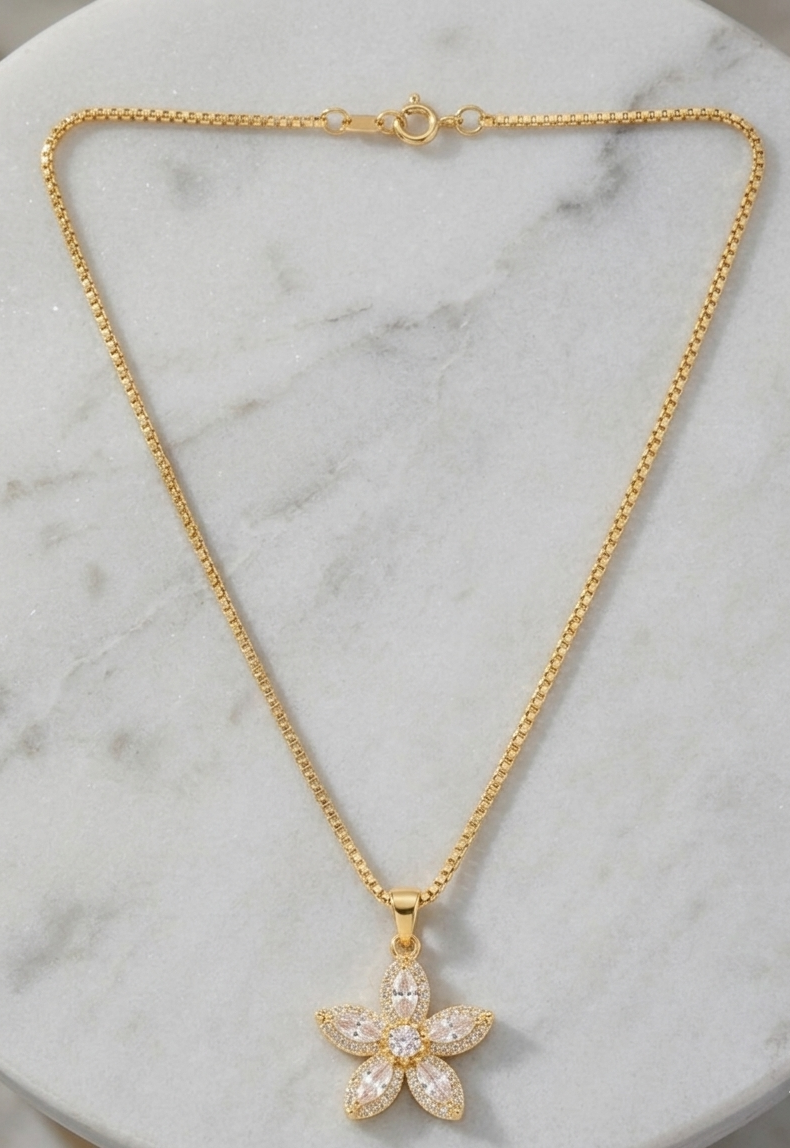 Ashir Studio star flower necklace featuring a delicate star and flower pendant, stylish jewelry for elegant accessories.