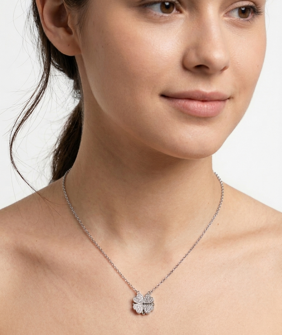 Ashir Studio magnetic four-leaf clover heart necklace featuring a silver-tone pendant with intricate leaf and heart design.