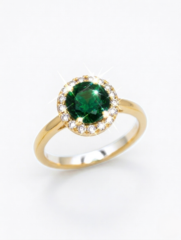 Elegant emerald green zirconia halo ring in 18K gold plating, showcasing a sparkling gemstone and intricate design.