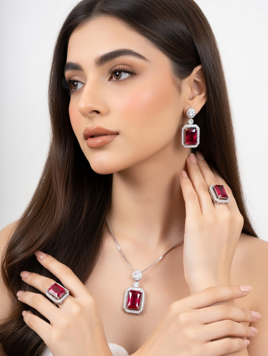 Ashir Studio Rubi jewellery set featuring vibrant red gemstone jewelry with intricate gold detailing.