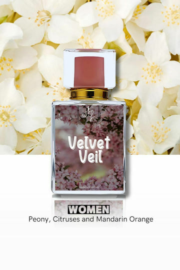 Velvet Veil perfume by Ashir Studio, elegant glass bottle with a soft velvet-textured cap, showcasing luxurious fragrance packaging.