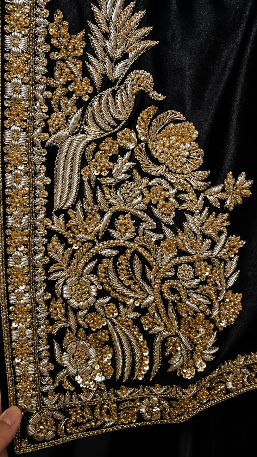 Elegant black and gold Tilla work long kurta by Ashir Studio featuring intricate embroidery and a flowing silhouette.