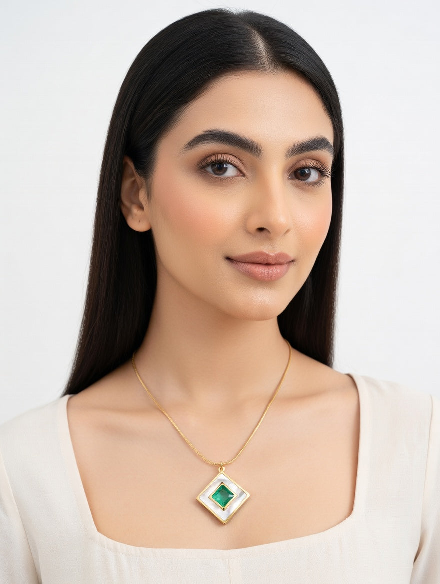 Imported emerald necklace by Ashir Studio featuring vibrant green gemstones and intricate jewelry design.