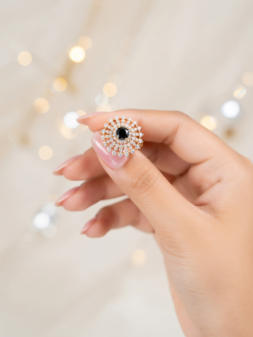 Ashir Studio Midnight Sunburst Onyx Halo Ring with 18K gold plating, tarnish-free jewelry showcasing a striking black onyx gemstone.