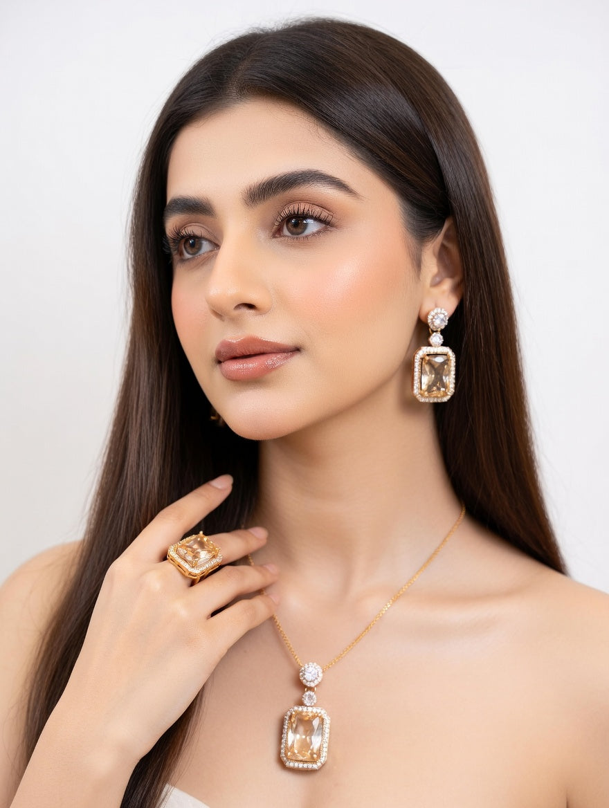 Elegant Ashir Studio Rubi jewelry set featuring vibrant red rubies and intricate gold detailing, perfect for special occasions.