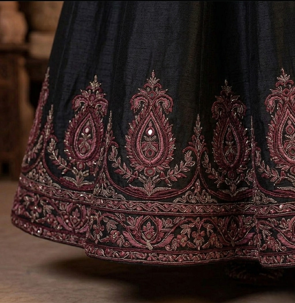 Maroon and gold embroidered black Anarkali gown by Ashir Studio, featuring intricate embroidery and flowing fabric.