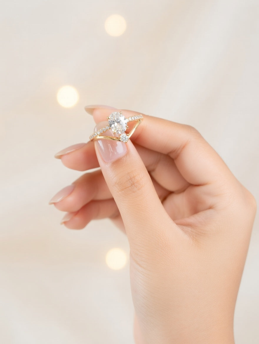Ashir Studio Luxe Oval V-Shaped Solitaire Ring in 18K gold plating with a tarnish-free finish, showcasing a sleek elegant jewelry design.