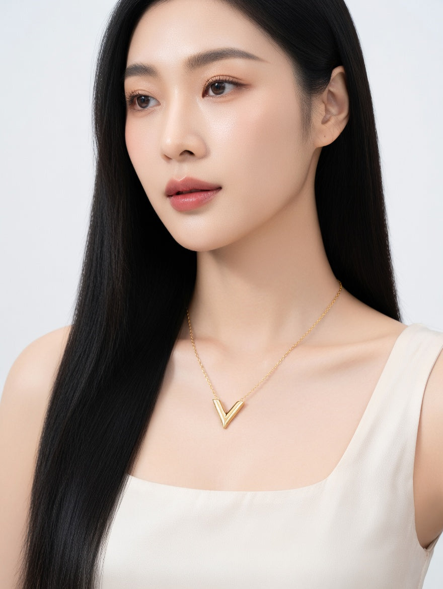 V-shaped necklace from Ashir Studio jewelry featuring a sleek, modern design with a delicate chain and elegant pendant.