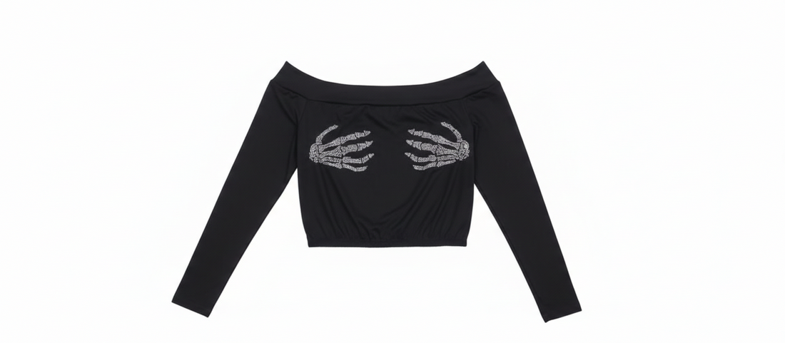Model wearing Ashir Studio Midnight Skeleton Bardot top, featuring a black skeleton print on a stylish Bardot neckline blouse.