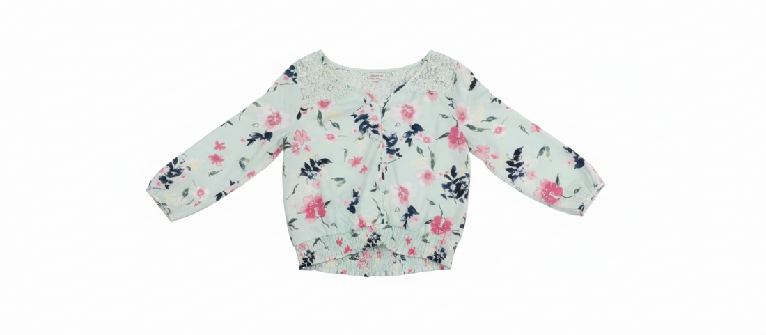 Model wearing the Blossom Breeze Blouse by Ashir Studio, showcasing the lightweight, flowy fabric and floral design.