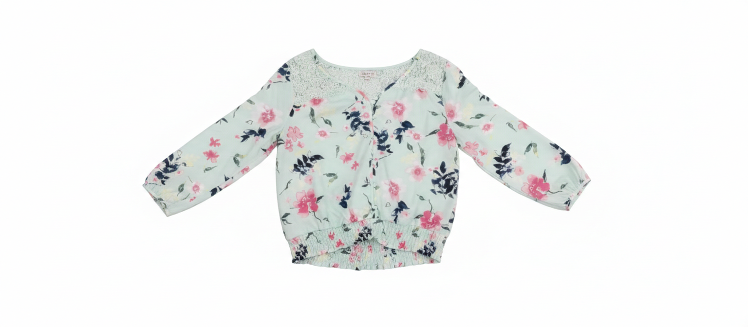 Pink Blossom Breeze Blouse from Ashir Studio featuring floral patterns and lightweight fabric, displayed on a hanger.