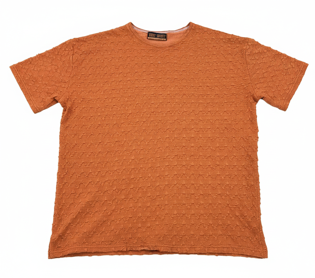 Dusty orange shirt from Ashir Studio, casual cloth with a soft fabric texture and relaxed fit, displayed on a hanger.