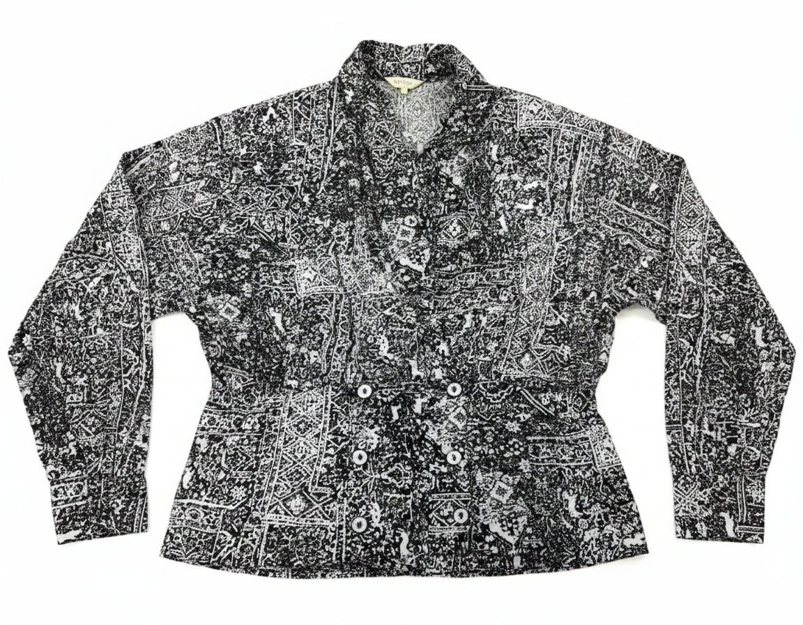 Ashir Studio Stardust Shirt in vibrant fabric with intricate patterns, displayed on a hanger against a neutral background.