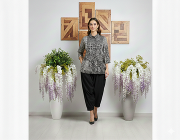 Model wearing the Ashir Studio Stardust Shirt in a stylish pose, showcasing the cloth's design and fit.