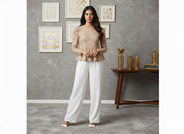 Long-sleeve lace peplum blouse by Ashir Studio featuring intricate lace details and a fitted peplum silhouette.