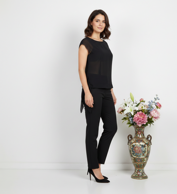 Ashir Studio cap-sleeve blouse in soft fabric, shown on a model with a round neckline and stylish short sleeves.