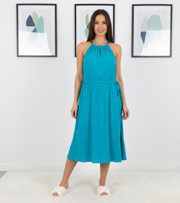 Ashir Studio teal halter cloth showing the front view on a model, featuring a stylish halter neckline and flowing fabric.