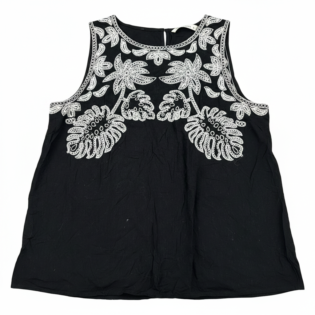 Black floral embroidered tank top from Ashir Studio, showcasing detailed floral embroidery and sleeveless design.