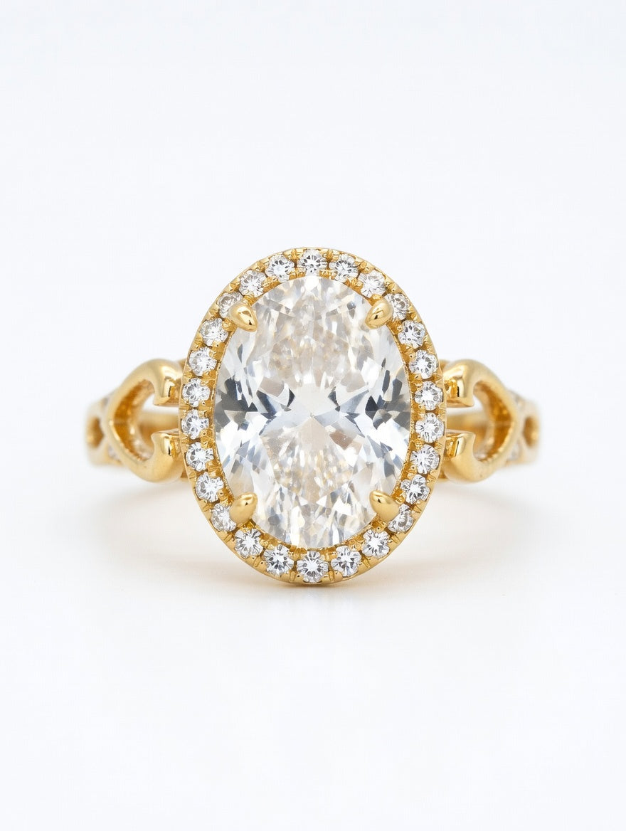 Ashir Studio Eternal Glow Oval Halo Statement Ring featuring a large oval gemstone and intricate band design.